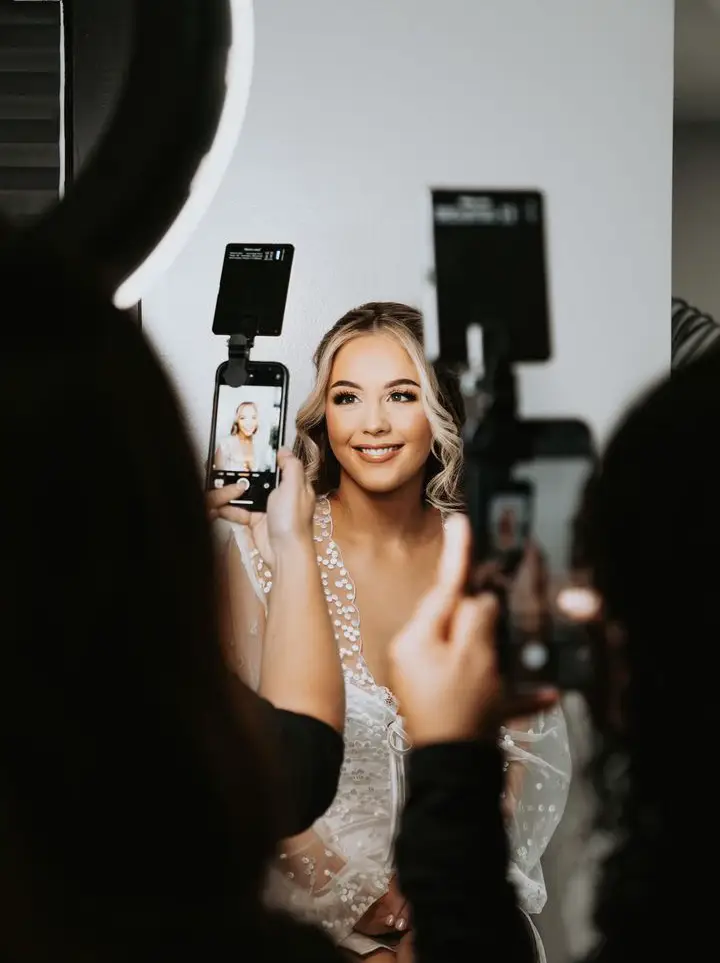 bride getting ready with wedding content creator